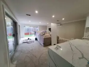 Freshly painted living and dining area in a South-East Melbourne home – professional interior painting by Kops Painting with neutral tones and clean finishes.